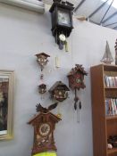 5 cuckoo clocks and 1 other