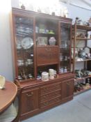 A mahogany effect display cabinet