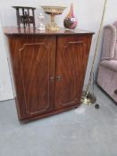 A mahogany effect TV cabinet