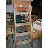 A wooden step ladder