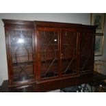 A mahogany glazed book case