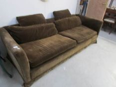 A brown velvet effect sofa