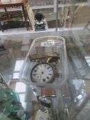 A silver pocket watch with silver chain and gold watch (both in need repair)
