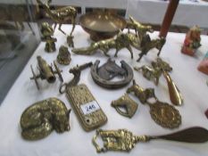 A collection of 22 items of brassware