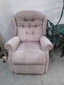 A reclining arm chair