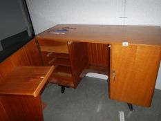 A teak cabinet come desk