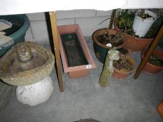 A large quantity of garden items in concrete