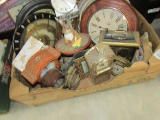 A box of assorted clocks