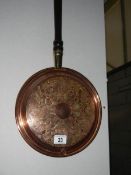 A copper warming pan