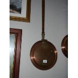 A copper warming pan