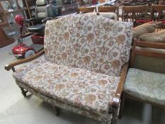 A cottage style 2 seat settee