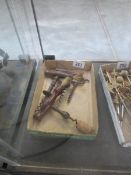 A quantity of 19 and 20th century corkscrews 2 with brushes