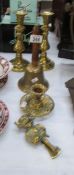 A brass Lincoln Imp door knocker, a pair of Victorian candlesticks,