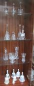 A large quantity of glass and porcelain bells etc.