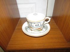 An Adams cup and saucer decorated with fighting cocks