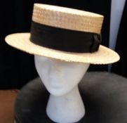 A black straw boater