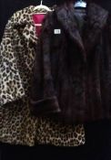 A faux leopard fur coat/jacket and a vintage fur coat