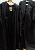 2 black graduation gowns,