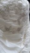 An ivory Da Vinci wedding gown,