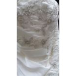 An ivory Da Vinci wedding gown,