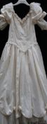 A 'Ronald Joyce' ivory wedding gown, very detailed,