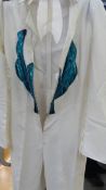 An Elvis white one piece costume with turquoise design (zip needs attention)