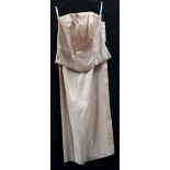 A gold 'Attire' bodice and matching slim fit skirt with vent,