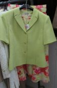 A Kasper short sleeved jacket and floral skirt,