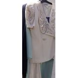 A Jersey masters skirt suit (size 14), a cream skirt suit (size 14),