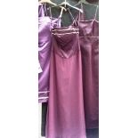 A purple evening gown and stole with bead detailing, size 10/12,