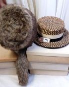 A vintage straw boater and a faux fur hat (mannequin head not included)