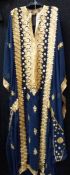 A long French navy kaftan with gold thread embroidery,
