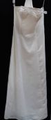 A 'Crystal Breeze' full length ivory slim fit gown with beaded bodice,