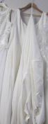 A 'Venue' by Lotus Orient Group ivory wedding gown with beaded bodice and train,