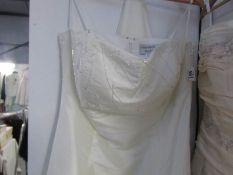 A Christine Elizabeth slimfit ivory bridal gown,