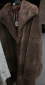 A long musquash fur coat