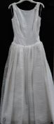 A white 'Alfred Angelo' waisted wedding gown with back lace detail,