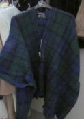 A tartan mohair cape with front zip