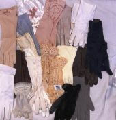A large collection of vintage ladies gloves including crochet, nylon,