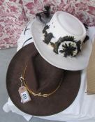 2 brimmed 'western' style hats with decoration