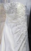 An Ivory 'Da Vinci' wedding gown with beaded embroidery and back lace detailing,
