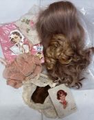 A collection of interesting vintage items including hair pieces,