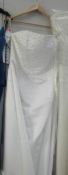 A 'Christine Elizabeth' slimfit ivory wedding gown with beaded bodice,