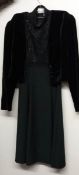 A black dress with black jacket,