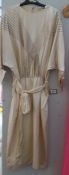A cream silk sequinned dress by designer Vic Romana, Paris,