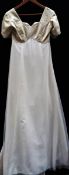 A 'Margaret Lee' empire line bridal / evening gown in gold and cream,