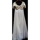 A 'Margaret Lee' empire line bridal / evening gown in gold and cream,