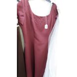 A 'Forever Yours' full length burgundy evening gown with decorative beaded bodice, 100% polyester,