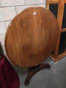 A good circular Victorian mahogany tip top table