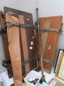 A vintage trouser press and a vintage curtain/door rail